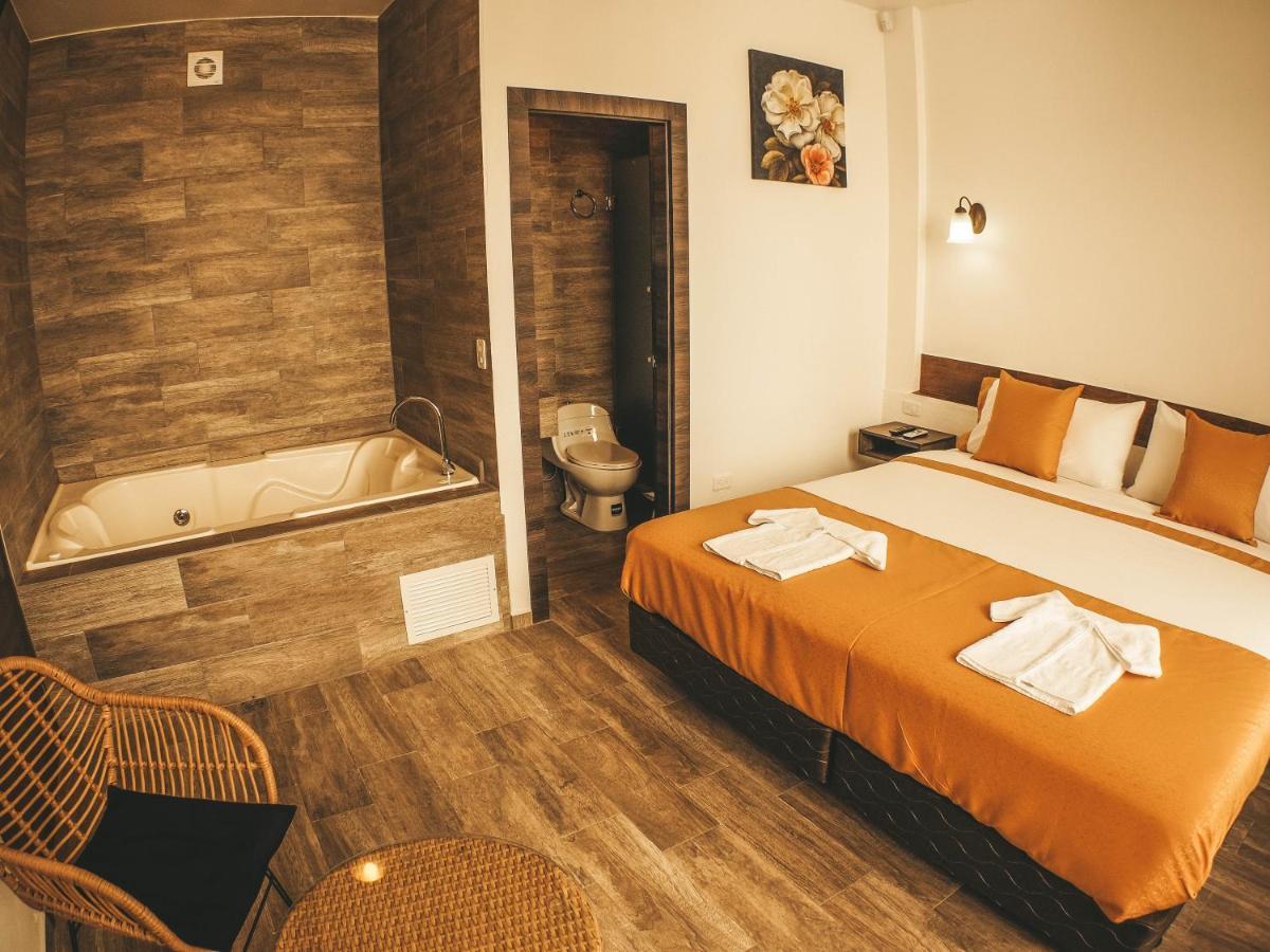 Toucan Platinum Suites Aparthotel Mindo Exterior foto